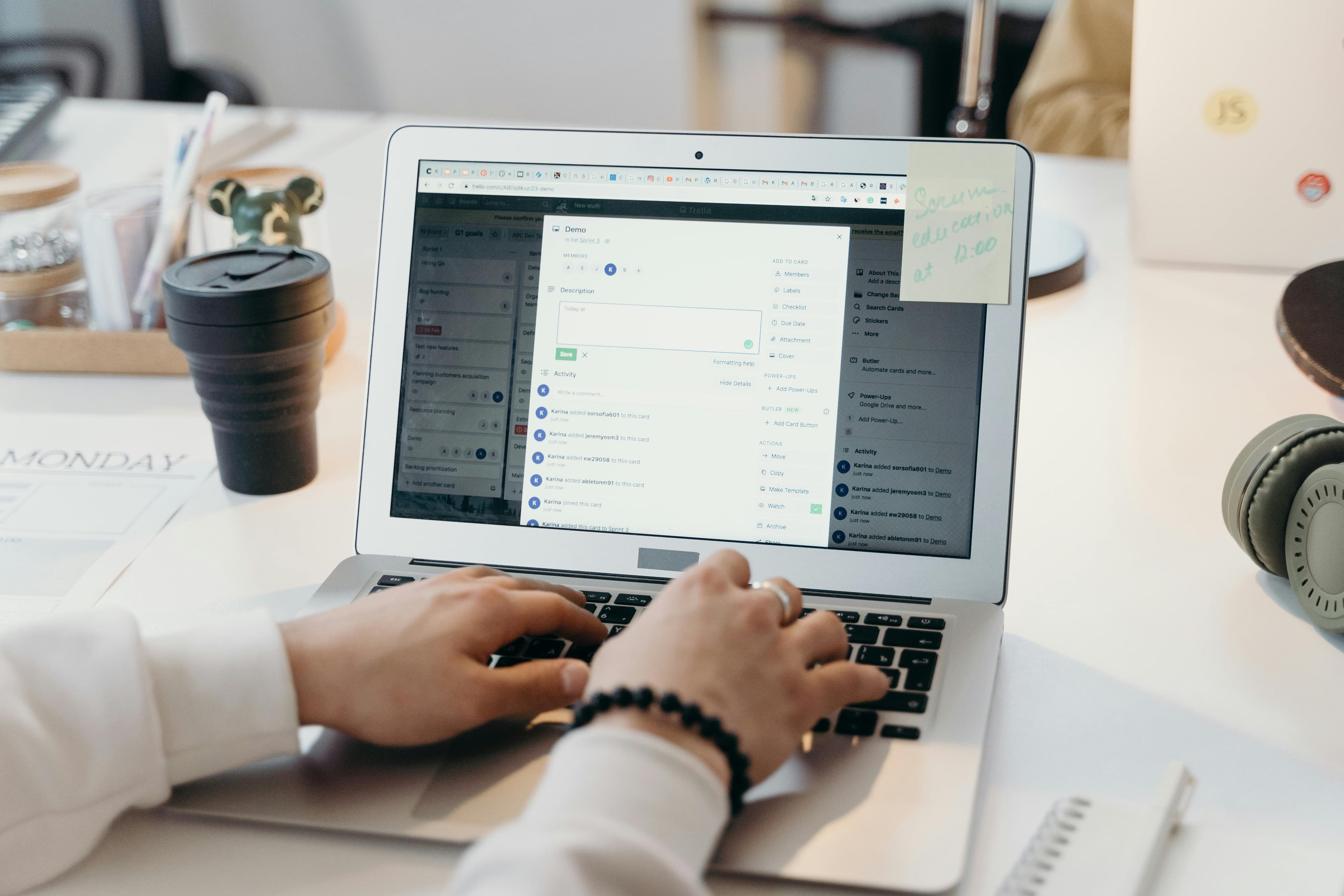 Person working at a laptop, representing a confidential automated communication workflow